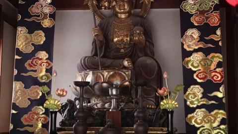 Interior view of a Buddhist altar at Adashino Nenbutsu-ji Temple, with a sacred Stock Footage 345226764