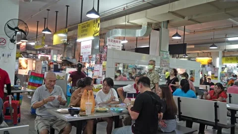 Interior view of the building ICC Pudu food court, there are many food stalls. Stock Footage 242649778