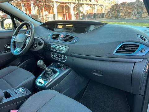 Interior view of a car showing the dashboard, steering wheel, and front sea.. Stock Photos
