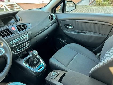 Interior view of a car showing the front seats, dashboard, and gear shift d.. Stock Photos