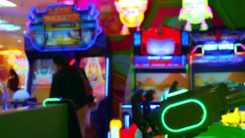 Interior view of colorful arcade game center Stock Footage 332831367