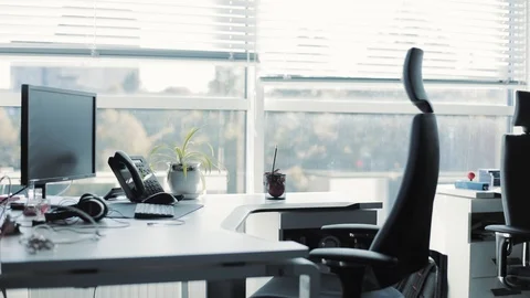 Interior view of a contemporary empty business office the chair returns inside Stock Footage 97274077