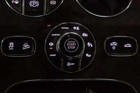 Interior view with control panel and start engine button of luxury very expen Stock Photos