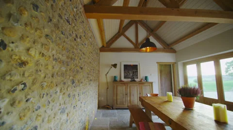 Interior view of dining area in stylish country home with lots of natural light Stock Footage 35111366