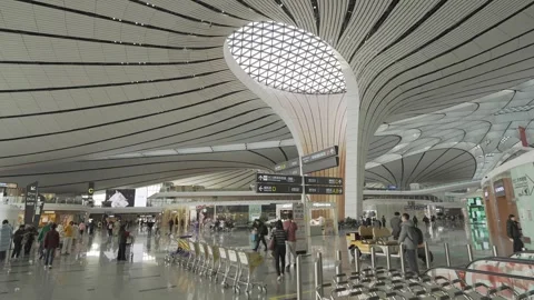 Interior view of domestic terminal with crowded of passenger in shopping re.. Видео 335582320