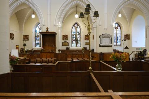 Interior View of Down Cathedral with Gothic Arches, Stained Glass Windows Stock Photos