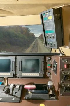 Interior view of the drivers cab inside train Stock Photos