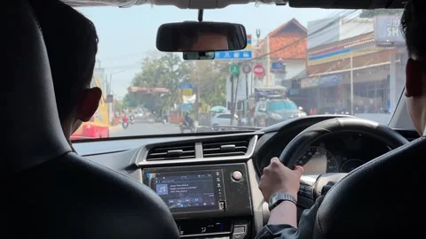 Interior View Driving Car Through Suburban Street in Cirebon Stock Footage 346406180