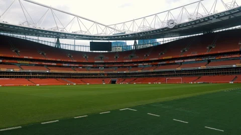 An interior view of an empty Emirates Stadium, home of the Arsenal Football Stock Footage 92771522