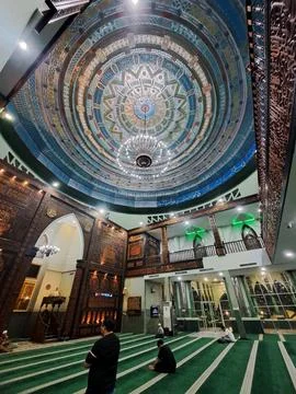 Interior View of Haji Hanif Mosque in Medan Featuring Carved Wooden Mihrab and O Stock Photos