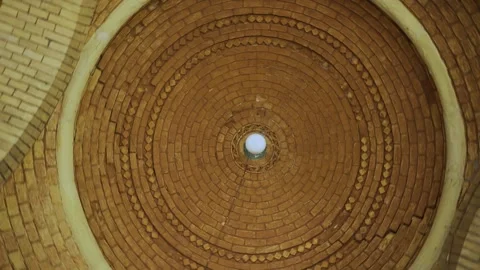Interior view of historic brick dome showcasing a mesmerizing circular pattern,  Stock Footage 262480936
