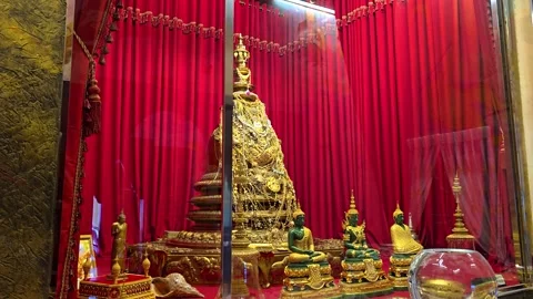 Interior view of the Holy Relic Shrine with golden Buddha statues. 4K Stock-Footage 339967031