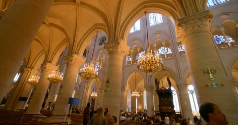 Interior view of iconic Notre Dame Cathedral, beautiful Paris landmark restored Stock Footage 321326847