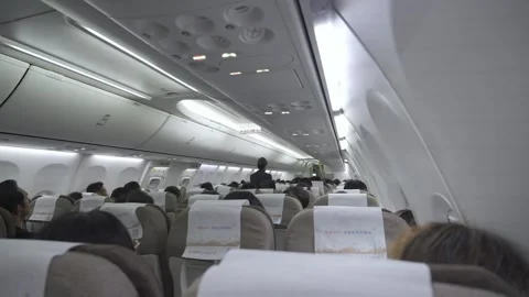 Interior view inside airplane cabin from the back in economy class full wit.. 库存影片 338331299