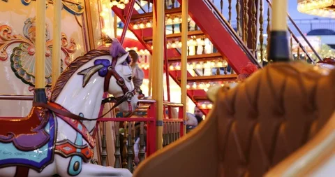 Interior view inside moving Carousel, roundabout or merry-go-round. Stock Footage 113702863