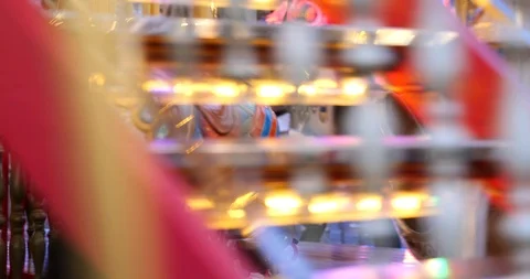 Interior view inside moving Carousel, roundabout or merry-go-round surround. Stock Footage 113703990