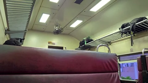 Interior view inside a moving old commuter train in South Asia. 4K Stock Footage 333874574