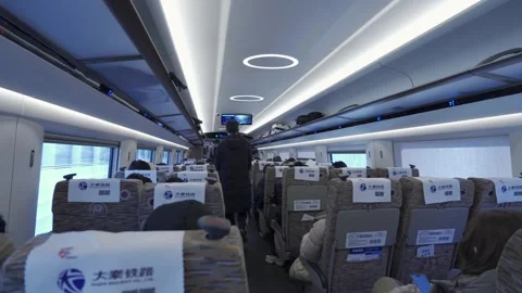 Interior view inside onboard highspeed bullet train in China full with pass.. 스톡 동영상 328715924