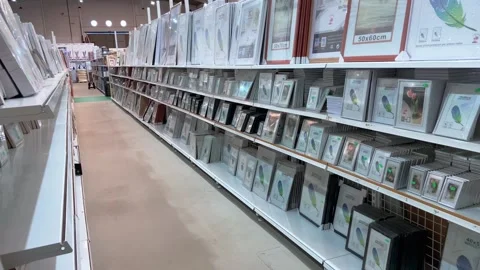 Interior view of large retail warehouse selling picture frames  Stock Footage 240098224