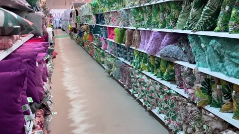Interior view of large retail warehouse selling soft furnishings for the home Stock Footage 240098228