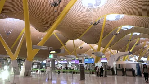 Interior view of Madrid-Barajas T4 Departure Hall showcasing Richard Rogers' Video stock 305435964