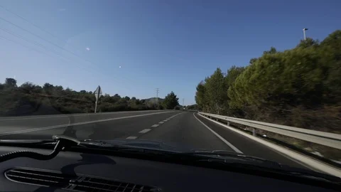 Interior view of a man driving Stock Footage 103135699