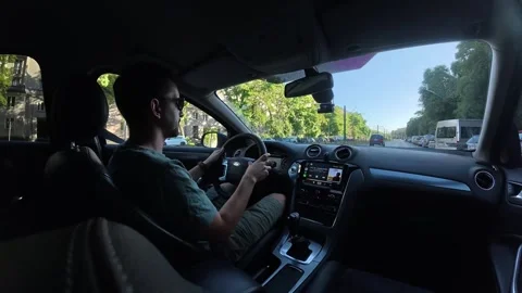 Interior view of a man driving a Ford Mondeo Mk4 Stock Footage 312232848