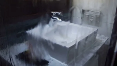 Interior view of a modern bathroom and washbasin Stock Footage 73972438