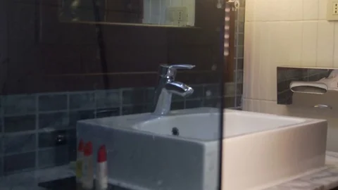 Interior view of a modern bathroom and washbasin Stock Footage 73974343