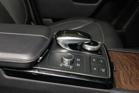 Interior view with multimedia joystick and dashboard of luxury very expensive Stock Photos