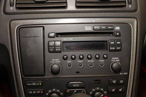 Interior view with multimedia system, cupholder and dashboard of black Volvo  Stock Photos