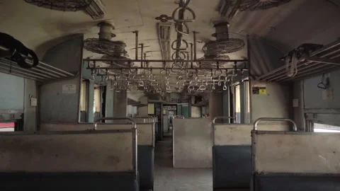 Interior view of a passenger train coach in Mumbai, India	 Stock Footage 341664289