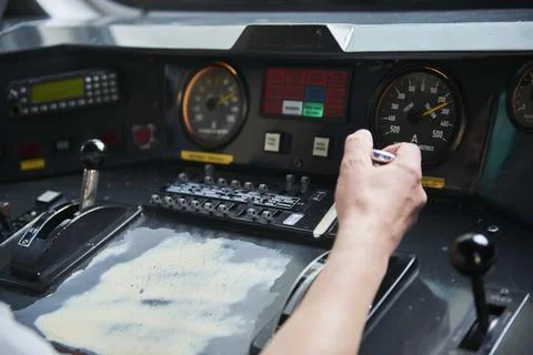 Interior view of the pilot hands and instrument panel cockpit of ancient trai Stock Photos