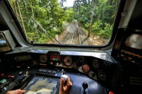 Interior view of the pilot hands and instrument panel cockpit of ancient trai Stock Photos