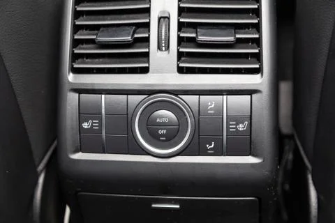 Interior view with rear climate-control dashboard of luxury very expensive ne Stock Photos