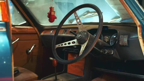 Interior View Showing Steering Wheel and Dashboard of Vintage Triumph Car Stock Footage 340880061