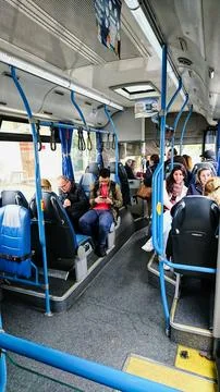 Interior view of a Sintra bus going to various attractions, tourists waiting for Stock Photos