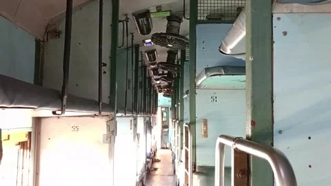 Interior view of a sleeper train's narrow hallway Stock Footage 277544145
