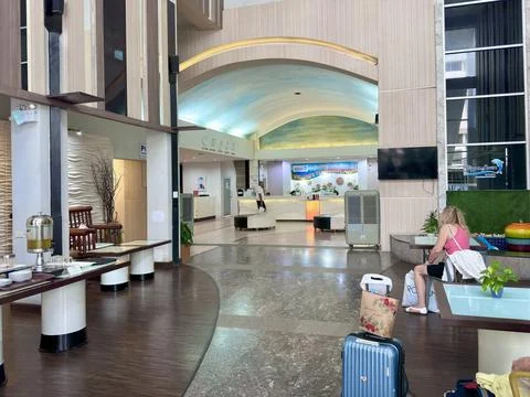 Interior view of the spacious lobby at Flipper House hotel with a high Stock Photos