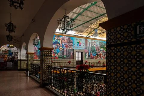 Interior view of town hall corridor with tiled columns and arches Stock Photos
