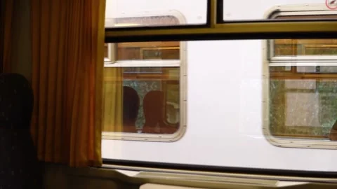 Interior view at train's empty window seat window.  Видео 159292801