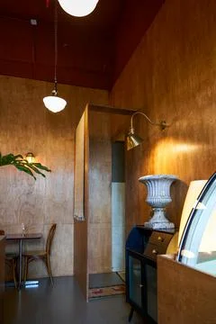 Interior view of a warmly decorated coffee shop Stock-Fotos