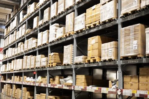 Interior Of Warehouse. Rows Of Shelves With Boxes. Stock Photos