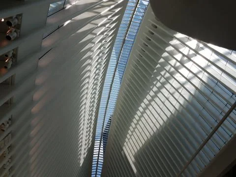 Interior of white building with sky light windows and sun Stock Photos