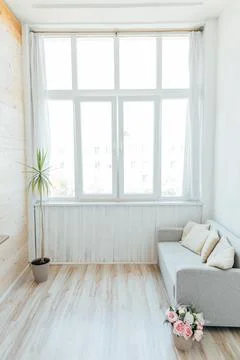 Interior of a white room with a large window 스톡 사진
