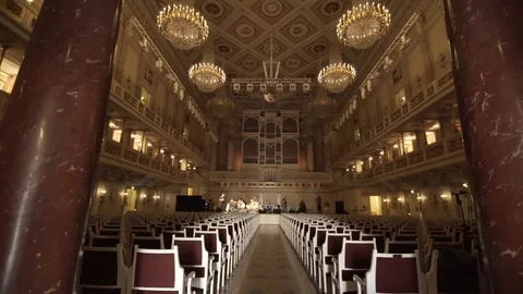 Interior wide shot of konzert concert house with beautiful chandelier in Stock Footage