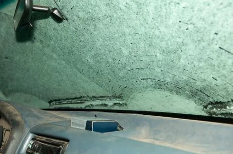 Interior windshield and dash of snowed in vehicle Foto stock