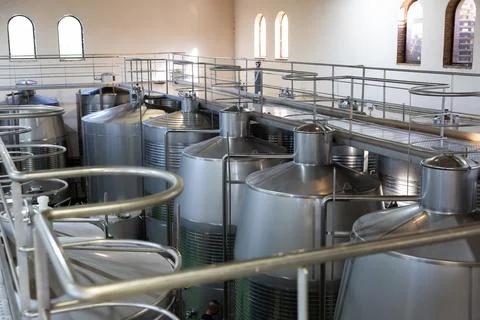 Interior of winery with stainless steel tanks Stock Photos