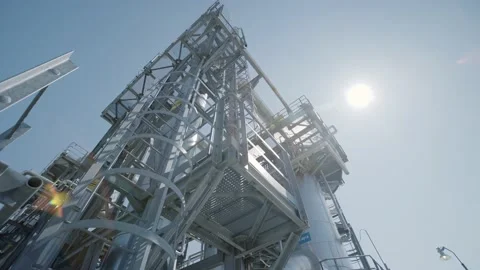 Interlacing pipes and metal structures against the blue sky Video stock 139265844