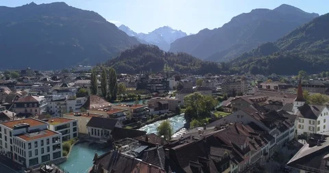 Interlaken long back flight with paraglider - Aerial 4K Stock Footage 117913610